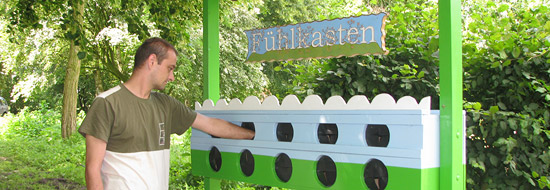 Darstellung von einer Person im Sinnesgarten